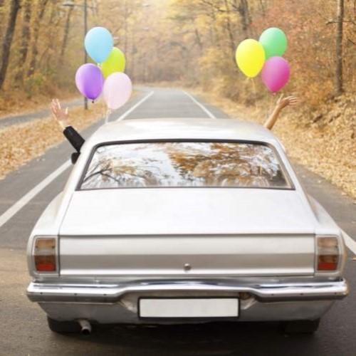 Vehicle with balloons.